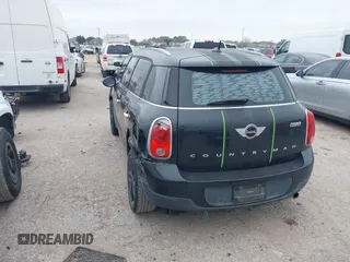 2015 MINI Countryman with VIN WMWZB3C53FWR43819, listed as a IAAI auction lot 41610007 with 134,185 mi miles and . Bid and sale history available at DreamBid. Image 3.