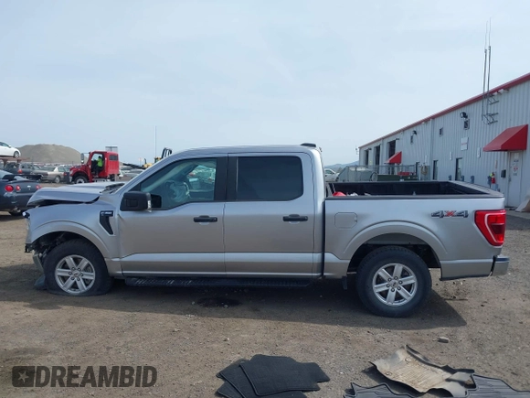 2021 Ford F-150 XL z VIN 1FTFW1E5XMFA28555, wystawiony jako IAAI lot #41814344 z przebiegiem 31 680 mil mil oraz . Historia ofert i sprzedaży dostępna na DreamBid. Obrazek 14.