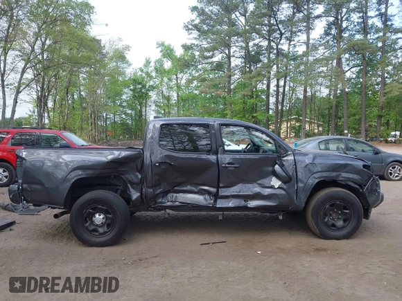 2022 Toyota Tacoma SR with VIN 3TYAX5GN1NT042099, listed as a IAAI auction lot 42081791 with 38,621 mi miles and . Bid and sale history available at DreamBid. Image 14.