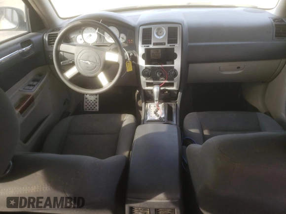 2005 Chrysler 300 with VIN 2C3JA43R25H663094, listed as a Copart auction lot 60813664 with 218,830 mi miles and Salvage Title. Bid and sale history available at carsss.com. Image 8.