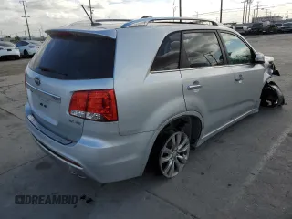 2012 Kia Sorento SX with VIN 5XYKWDA29CG302920, listed as a Copart auction lot 56237235 with 137,998 mi miles and Salvage title. Bid and sale history available at DreamBid. Image 3.