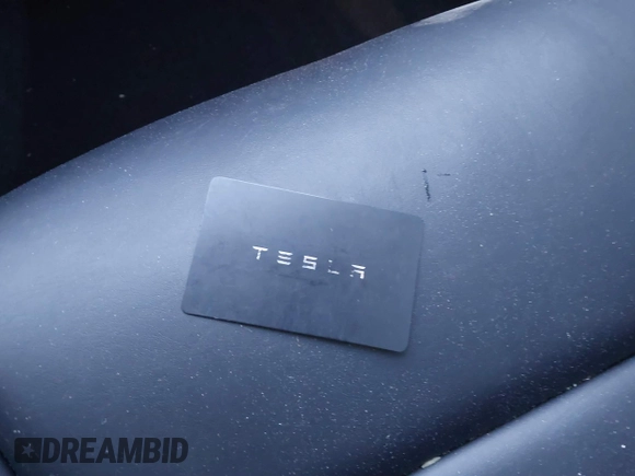 2022 Tesla Model Y Performance with VIN 7SAYGDEFXNF313636, listed as a IAAI auction lot 41660019 with 30,258 mi miles and . Bid and sale history available at DreamBid. Image 11.
