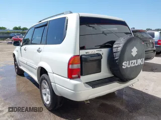 2003 Suzuki XL-7 Touring with VIN JS3TX92V934104149, listed as a IAAI auction lot 41911536 with 140,199 mi miles. Bid and sale history available at carsss.com. Image 3.