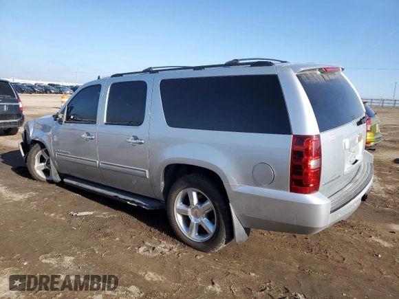 2013 Chevrolet Suburban LS with VIN 1GNSKHE7XDR139052, listed as a Copart auction lot 84878314 with 219,943 mi miles and Clean Title. Bid and sale history available at carsss.com. Image 2.