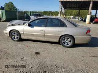2001 Cadillac Catera z VIN W06VR54R21R039740, wystawiony jako Copart lot #77206494 z przebiegiem 41 180 mil mil oraz Szkody całkowita. Historia ofert i sprzedaży dostępna na DreamBid. Obrazek 2.