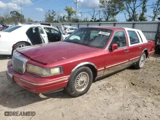 1995 Lincoln Town Car Signature with VIN 1LNLM82W2SY713693, listed as a Copart auction lot 75430484 with 156,859 mi miles and Salvage Title. Bid and sale history available at carsss.com. Image 1.