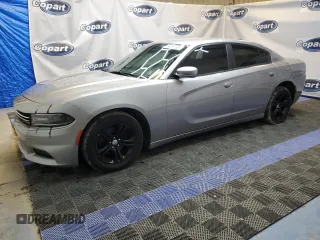 2015 Dodge Charger SE z VIN 2C3CDXBG2FH813059, wystawiony jako Copart lot #51616275 z przebiegiem 161 001 mil mil oraz Czysty tytuł • Clean title. Historia ofert i sprzedaży dostępna na DreamBid. Obrazek 1.