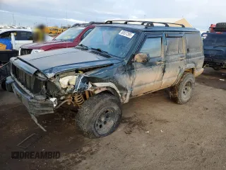 1997 Jeep Cherokee Country z VIN 1J4FJ78SXVL566804, wystawiony jako Copart lot #88557395 z przebiegiem 216 230 mil mil oraz Szkoda całkowita • Salvage title. Historia ofert i sprzedaży dostępna na DreamBid. Obrazek 1.