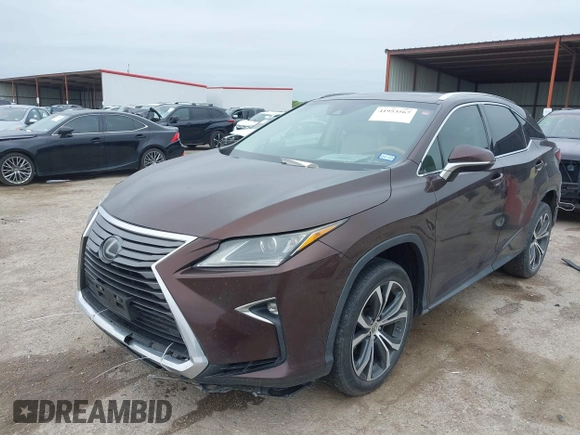 2016 Lexus RX 350 z VIN 2T2ZZMCA5GC029529, wystawiony jako IAAI lot #41953567 z przebiegiem 133 460 mil mil oraz . Historia ofert i sprzedaży dostępna na DreamBid. Obrazek 17.