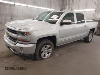 2017 Chevrolet Silverado 1500 LT with VIN 3GCUKREC5HG318772, listed as a IAAI auction lot 42056116 with 82,987 mi miles and . Bid and sale history available at DreamBid. Image 18.