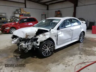 2016 Mitsubishi Lancer GT with VIN JA32U8FW9GU011121, listed as a Copart auction lot 82325464 with 101,202 mi miles and Salvage Title. Bid and sale history available at carsss.com. Image 1.