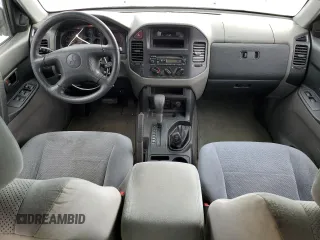 2002 Mitsubishi Montero XLS z VIN JA4MW31R02J005334, wystawiony jako Copart lot #79394064 z przebiegiem 285 949 mil mil oraz Czysty tytuł • Clean title. Historia ofert i sprzedaży dostępna na DreamBid. Obrazek 8.