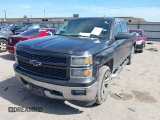 2015 Chevrolet Silverado 1500 LT with VIN 3GCUKREC2FG232302, listed as a IAAI auction lot 41652224 with 231,334 mi miles. Bid and sale history available at carsss.com. Image 2.