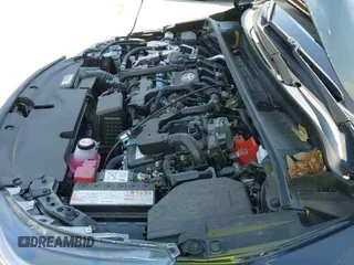 2025 Toyota Corolla Hybrid LE with VIN JTDBCMFE9SJ040987, listed as a IAAI auction lot 43008298 with 7,168 mi miles and . Bid and sale history available at DreamBid. Image 21.