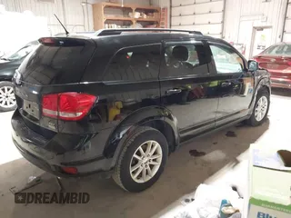 2016 Dodge Journey SXT with VIN 3C4PDCBG4GT206806, listed as a IAAI auction lot 41855100 with 169,554 mi miles. Bid and sale history available at carsss.com. Image 4.