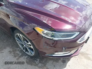 2017 Ford Fusion Titanium with VIN 3FA6P0K97HR214485, listed as a IAAI auction lot 40208619 with 39,265 mi miles and . Bid and sale history available at DreamBid. Image 17.