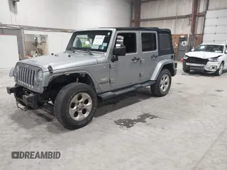 2014 Jeep Wrangler Unlimited Sahara with VIN 1C4BJWEG5EL164350, listed as a IAAI auction lot 42018586 with 113,222 mi miles. Bid and sale history available at carsss.com. Image 20.
