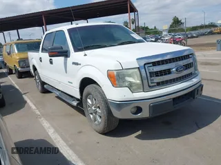 2014 Ford F-150 XL with VIN 1FTFW1CT8EKF55164, listed as a IAAI auction lot 42111483 with 233,166 mi miles. Bid and sale history available at carsss.com. Image 1.