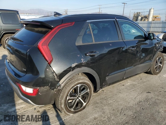 2023 Kia Niro EX with VIN KNDCR3LE9P5076681, listed as a Copart auction lot 42522465 with 56,896 mi miles and Salvage Title. Bid and sale history available at carsss.com. Image 3.