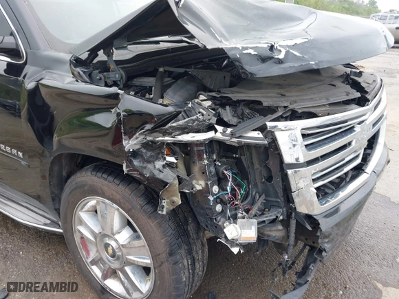 2015 Chevrolet Suburban LTZ with VIN 1GNSCKKC6FR271675, listed as a IAAI auction lot 41915036 with 150,917 mi miles. Bid and sale history available at carsss.com. Image 6.