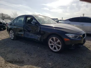 2013 BMW 3 Series 335i xDrive with VIN WBA3B9G58DNR89894, listed as a Copart auction lot 49087945 with 70,141 mi miles and Salvage title. Bid and sale history available at DreamBid. Image 4.