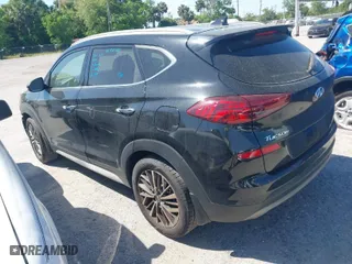 2021 Hyundai Tucson Limited with VIN KM8J33AL9MU305948, listed as a IAAI auction lot 41834956 with 100,098 mi miles. Bid and sale history available at carsss.com. Image 3.