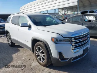 2023 GMC Acadia SLT with VIN 1GKKNML47PZ168955, listed as a IAAI auction lot 41808713 with 54,008 mi miles and . Bid and sale history available at carsss.com. Image 1.