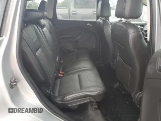 2013 Ford Escape Titanium with VIN 1FMCU9J94DUB00695, listed as a Copart auction lot 56633955 with 129,011 mi miles and Salvage title. Bid and sale history available at DreamBid. Image 11.