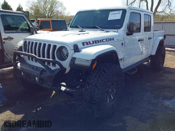 2021 Jeep Gladiator Rubicon with VIN 1C6JJTBG4ML536085, listed as a IAAI auction lot 41898204 with 39,627 mi miles and . Bid and sale history available at DreamBid. Image 17.