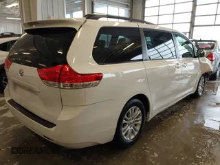 2014 Toyota Sienna XLE with VIN 5TDYK3DC5ES508021, listed as a IAAI auction lot 41963128 with 162,578 mi miles. Bid and sale history available at carsss.com. Image 4.
