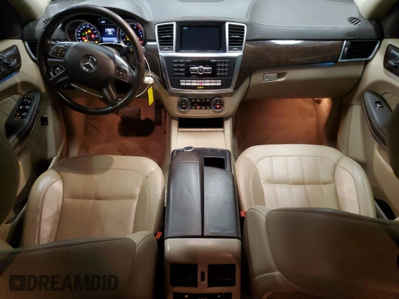 2014 Mercedes-Benz GL 450 z VIN 4JGDF7CE1EA311613, wystawiony jako Copart lot #52624995 z przebiegiem 134 404 mil mil oraz Tytuł czysty. Historia ofert i sprzedaży dostępna na DreamBid. Obrazek 8.