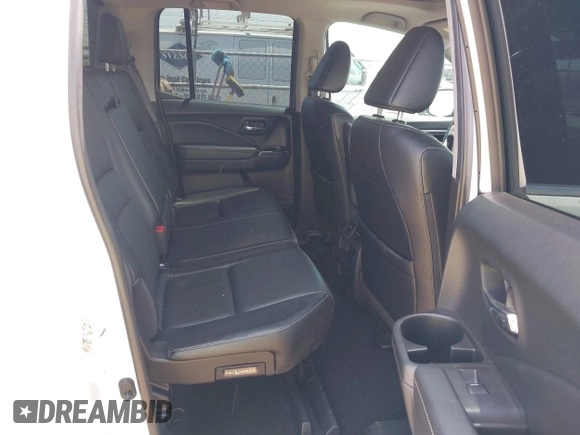 2023 Honda Ridgeline RTL z VIN 5FPYK3F51PB028295, wystawiony jako IAAI lot #42031783 z przebiegiem 39 228 mil mil oraz . Historia ofert i sprzedaży dostępna na DreamBid. Obrazek 8.