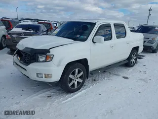 2014 Honda Ridgeline SE with VIN 5FPYK1F6XEB007553, listed as a IAAI auction lot 41281193 with 159,699 mi miles. Bid and sale history available at carsss.com. Image 2.