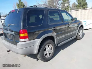 2001 Ford Escape XLT with VIN 1FMCU03181KA15501, listed as a IAAI auction lot 41857955 with 157,344 mi miles. Bid and sale history available at carsss.com. Image 4.