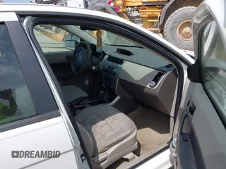 2009 Ford Focus SE with VIN 1FAHP35NX9W203482, listed as a IAAI auction lot 41870714 with 184,823 mi miles. Bid and sale history available at carsss.com. Image 5.
