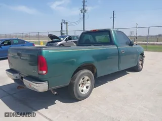 1999 Ford F-150 Work Series with VIN 1FTRF17W3XKB02350, listed as a IAAI auction lot 41789597 with 1 mi miles. Bid and sale history available at carsss.com. Image 4.
