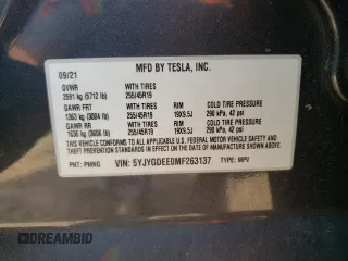 2021 Tesla Model Y Long Range z VIN 5YJYGDEE0MF263137, wystawiony jako Copart lot #57295705 z przebiegiem 63 627 mil mil oraz Szkoda całkowita • Salvage title. Historia ofert i sprzedaży dostępna na DreamBid. Obrazek 12.
