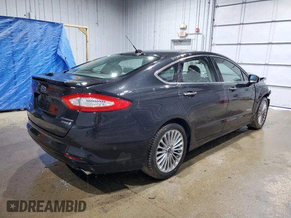 2014 Ford Fusion Titanium Hybrid with VIN 3FA6P0RU8ER238087, listed as a Copart auction lot 52515995 with Not provided miles and Salvage title. Bid and sale history available at DreamBid. Image 3.