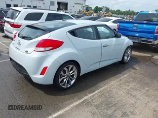 2015 Hyundai Veloster z VIN KMHTC6AD8FU222744, wystawiony jako IAAI lot #42129397 z przebiegiem Nie podano mil oraz . Historia ofert i sprzedaży dostępna na DreamBid. Obrazek 4.