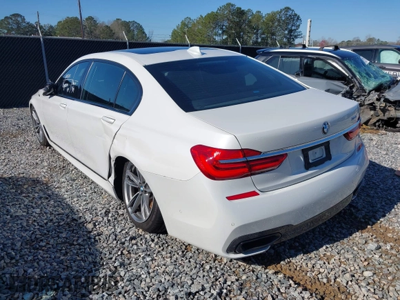 2017 BMW 7 Series 750i with VIN WBA7F0C34HGM21738, listed as a IAAI auction lot 41772933 with 62,923 mi miles and . Bid and sale history available at DreamBid. Image 3.