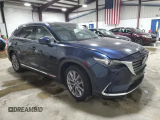 2023 Mazda CX-9 Grand Touring with VIN JM3TCBDY1P0630868, listed as a Copart auction lot 56321205 with 50,427 mi miles and Salvage title. Bid and sale history available at DreamBid. Image 4.
