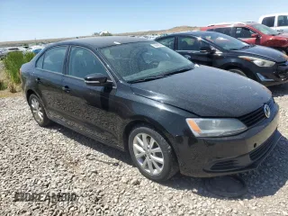2012 Volkswagen Jetta SE with VIN 3VWDX7AJ4CM418234, listed as a Copart auction lot 60942805 with 143,652 mi miles and Clean title. Bid and sale history available at DreamBid. Image 4.