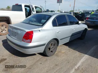 2004 Hyundai Elantra GLS z VIN KMHDN46D54U783394, wystawiony jako IAAI lot #42081704 z przebiegiem 186 301 mil mil oraz . Historia ofert i sprzedaży dostępna na DreamBid. Obrazek 4.