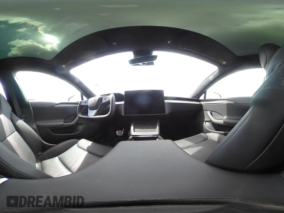 2022 Tesla Model S Plaid with VIN 5YJSA1E6XNF473888, listed as a IAAI auction lot 42141141 with 28,584 mi miles and . Bid and sale history available at carsss.com. Image 20.