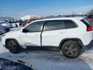 2016 Jeep Cherokee Latitude with VIN 1C4PJMCB7GW304109, listed as a IAAI auction lot 41330879 with 114,503 mi miles. Bid and sale history available at carsss.com. Image 14.