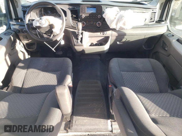 2021 Ford Transit Cargo with VIN 1FTBR1Y87MKA44540, listed as a Copart auction lot 74791034 with 128,242 mi miles and Salvage title. Bid and sale history available at DreamBid. Image 8.
