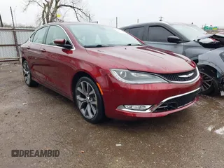 2015 Chrysler 200 C with VIN 1C3CCCCG1FN549009, listed as a IAAI auction lot 41702587 with 61,733 mi miles and . Bid and sale history available at carsss.com. Image 1.