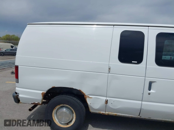2004 Ford Econoline Cargo with VIN 1FTNE24W84HB38152, listed as a IAAI auction lot 42090193 with 102,357 mi miles. Bid and sale history available at carsss.com. Image 14.