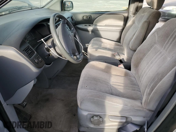 1999 Toyota Sienna CE with VIN 4T3ZF19C1XU146082, listed as a Copart auction lot 82063524 with 158,294 mi miles and Clean Title. Bid and sale history available at carsss.com. Image 7.