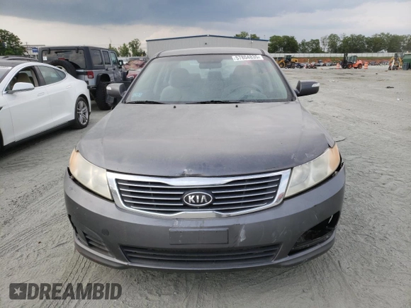 2009 Kia Optima LX z VIN KNAGE228695331919, wystawiony jako Copart lot #57804835 z przebiegiem 199 204 mil mil oraz Szkoda całkowita • Salvage title. Historia ofert i sprzedaży dostępna na DreamBid. Obrazek 5.